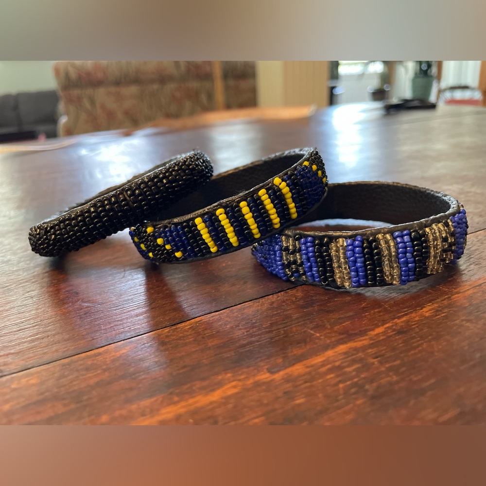 Set of three beaded bangle bracelets